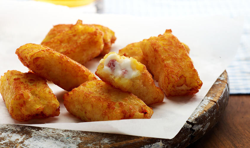 Pur&egrave; e specialit&agrave; di patate - Tasche di patate con prosciutto e mozzarella